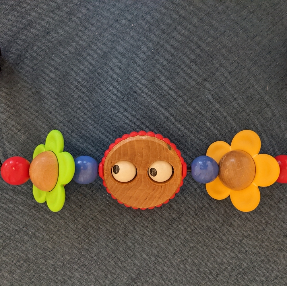 Used condition wooden Baby Bjorn Toy Bar